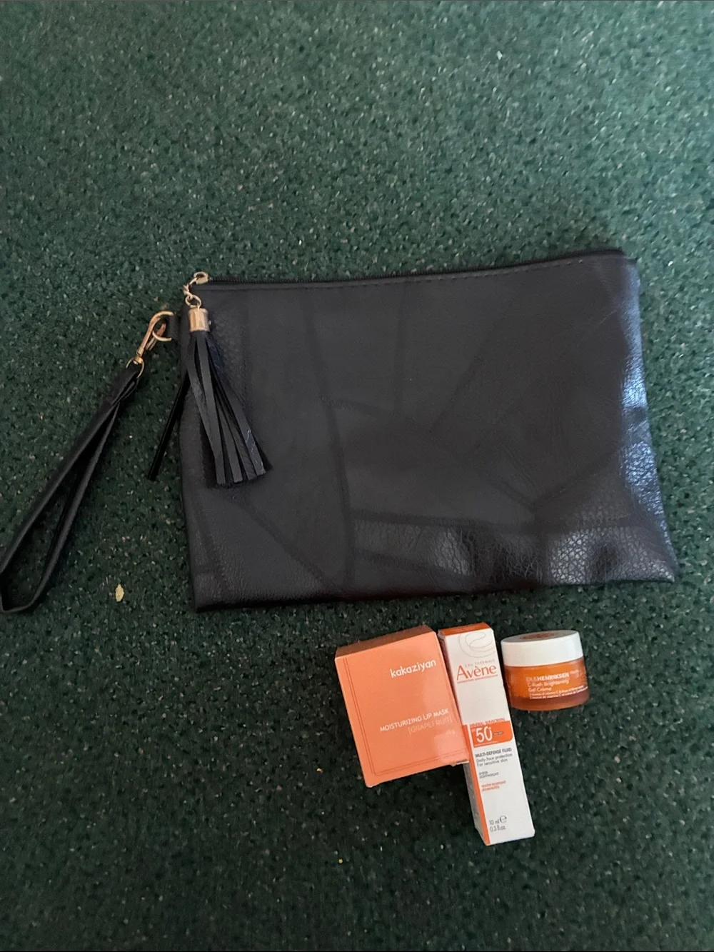 Ole Henriksen black leather